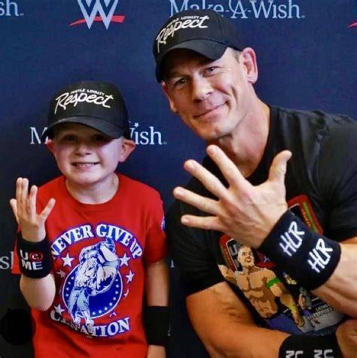 Cena with a kid during Make A Wish campaign