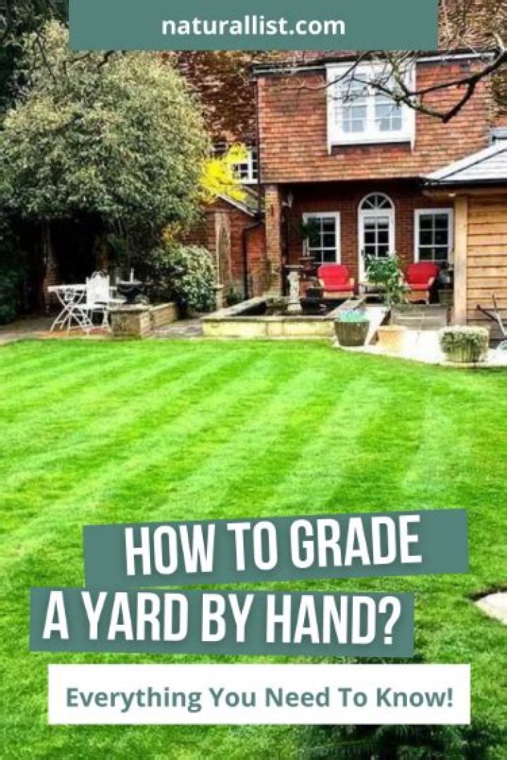 How do I grade my yard by hand?