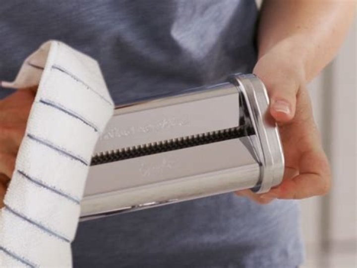 How do you clean KitchenAid Pasta Attachments?