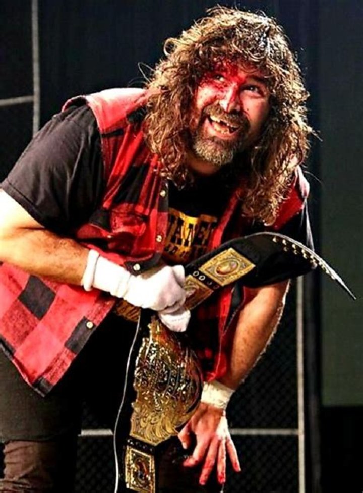 Mick Foley: The Many Characters of the WWE Superstar 5 Mick Foley wrestling as himself in 2004