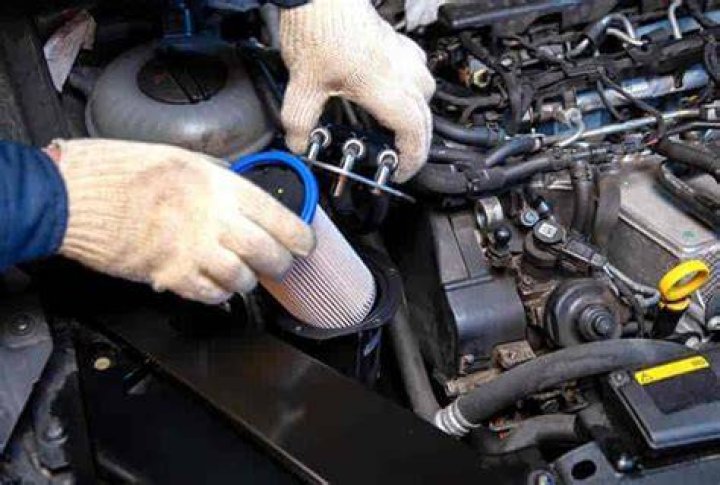 Where is the fuel filter on a 2003 Altima?